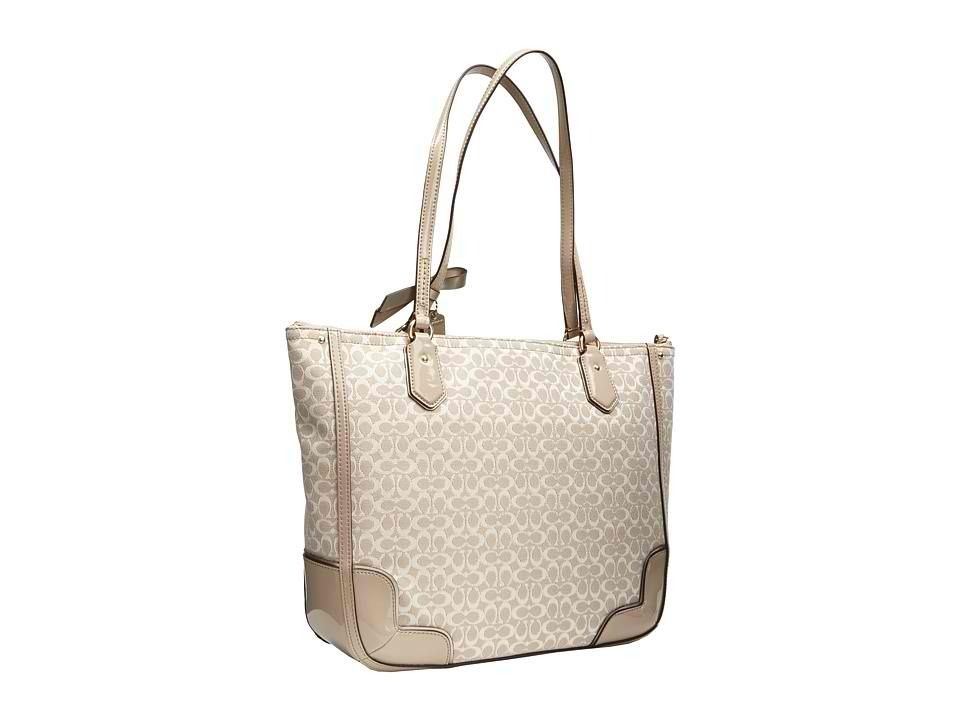 Super Decluttering SALE!!! Coach Signature Tote Bag (Category: Luxury Bags & Wallets) located in San Juan City. Submitted by love_tycoonj (Listing ID 1409205907, Image 2). Description: from COACH boutique, NOT outlet :) has flaws that's why so cheap, please check the photos :) Coach tote bag in beige with gold-tone hardware. Features a signature pattern, zip closure, double top handles, and a back zip pocket. Purple lined interior with a zip pock