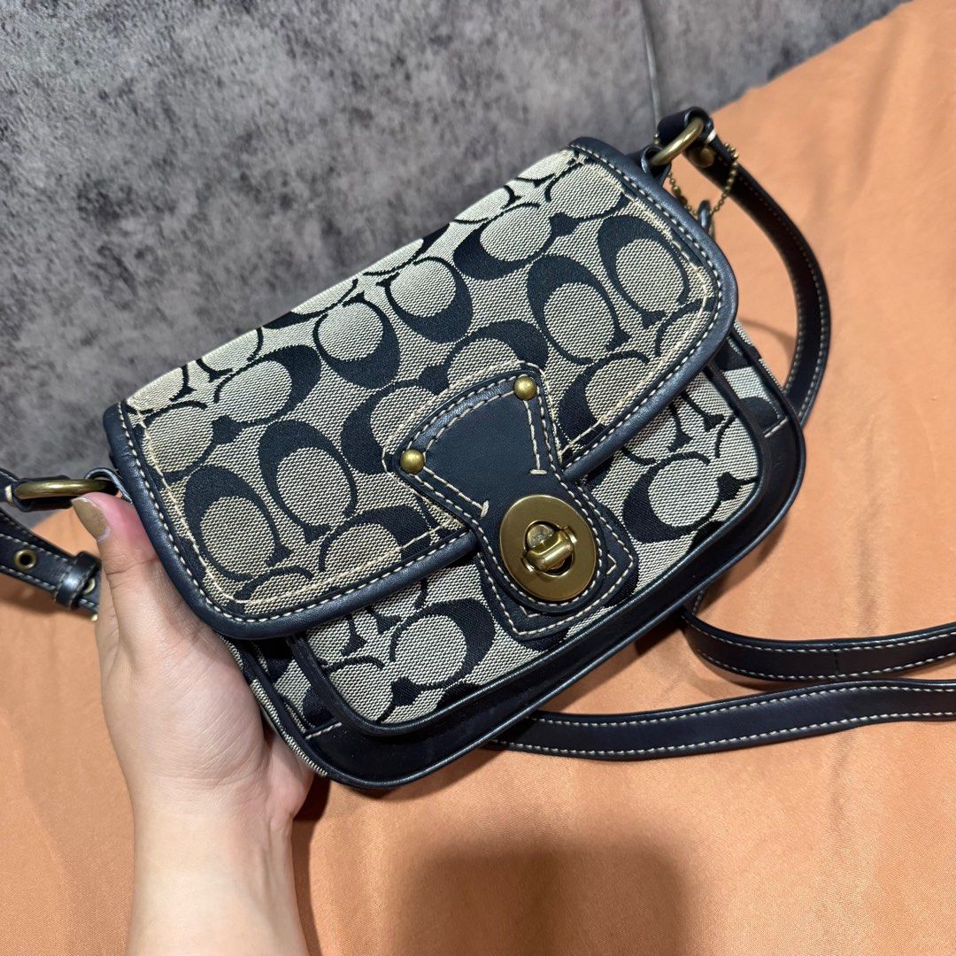 Coach Vintage Signature Turn Lock (Category: Luxury Bags & Wallets) located in Bulacan. Submitted by kcbd08 (Listing ID 1409186847, Image 2). Description: Needs cleaning lang ng canvas Leather and hardware super ganda pa.