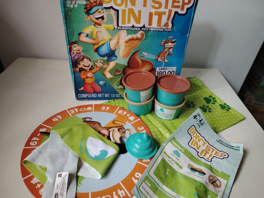 Don't Step In It! Blindfolded Poo Dodging Fun Game (Category: Board Games & Puzzles) located in General Trias. Submitted by Jingthings (Listing ID 1409240042, Image 1). Description: Get ready for some hilarious fun with the Don't Step In It! game! This game includes a game board, blindfold, and compound to create the poo. Spin the spinner and take steps across the mat, trying to avoid the poo. It's a fun and silly game for kids and adults alike. 