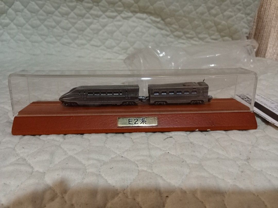 E2 Series Model Train (Category: Vehicle & Diecast Models) located in Bocaue. Submitted by marajapansurplus (Listing ID 1409117024, Image 2). Description: - E2 Series Model Train Set - Two-car train model - Presented on a wooden base - Protected by a clear plastic case - Highly detailed replica.