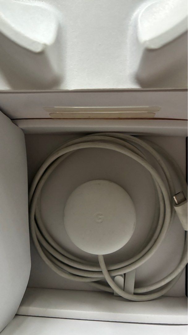 Google Home Mini - Chalk (Category: Soundbars, Speakers & Amplifiers) located in Paranaque City. Submitted by enchanting_f1nds (Listing ID 1409172345, Image 3). Description: Google Home Mini in Chalk color. Includes the Google Home Mini, AC power adapter, and documentation. The box indicates the product is designed by Google and made in China. The color of the product may vary from the image. The manufacturing date is July 2018..