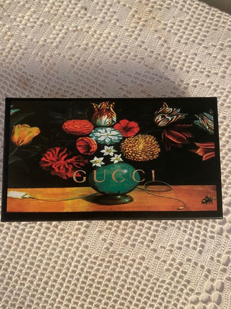 Gucci GG Supreme Wallet (Category: Luxury Bags & Wallets) located in Tanza. Submitted by gwen1905 (Listing ID 1409127430, Image 3). Description: - Gucci wallet - Iconic GG Supreme canvas with green and red stripe - Multiple card slots and compartments - Includes original box - Includes dust bag - Includes authenticity cards - Dent in box.