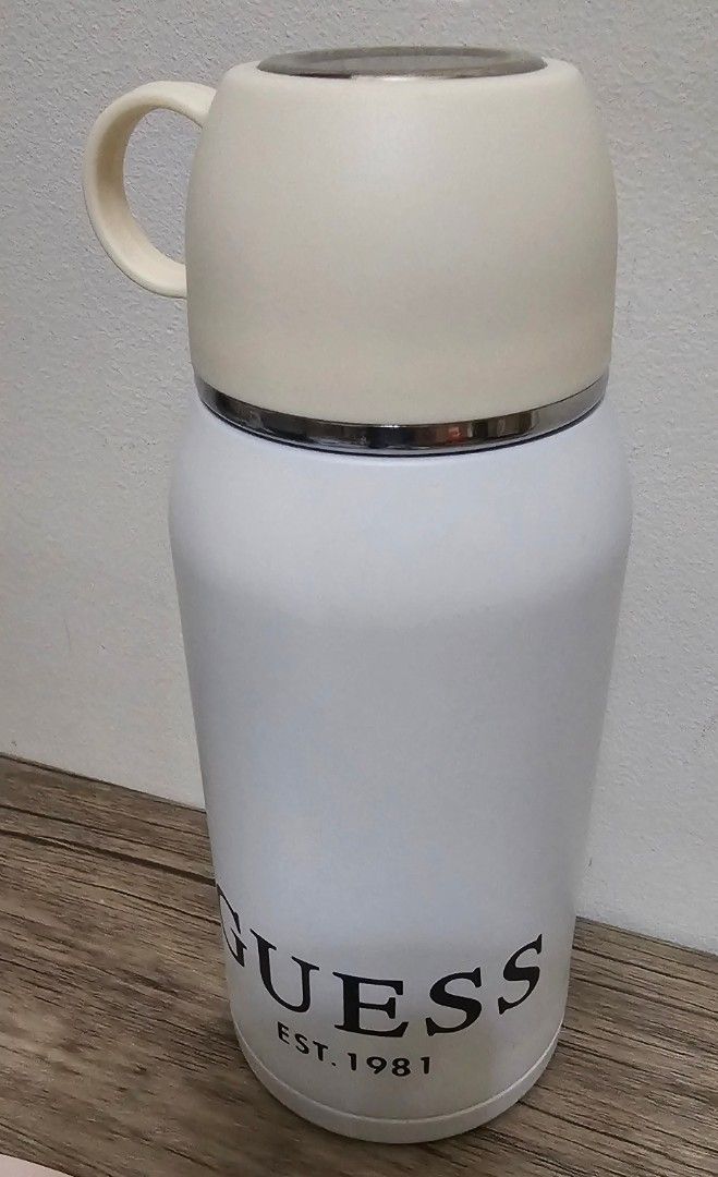 Guess Thermos with Cup (Category: Coffee & Tea Tableware) located in Manila. Submitted by sterling_grace (Listing ID 1409115104, Image 1). Description: - White Guess thermos and cup set. - Push-button lid for easy use. - Cup doubles as a lid. - Guess logo on the front. - Made of stainless steel - Box was removed during shipment .