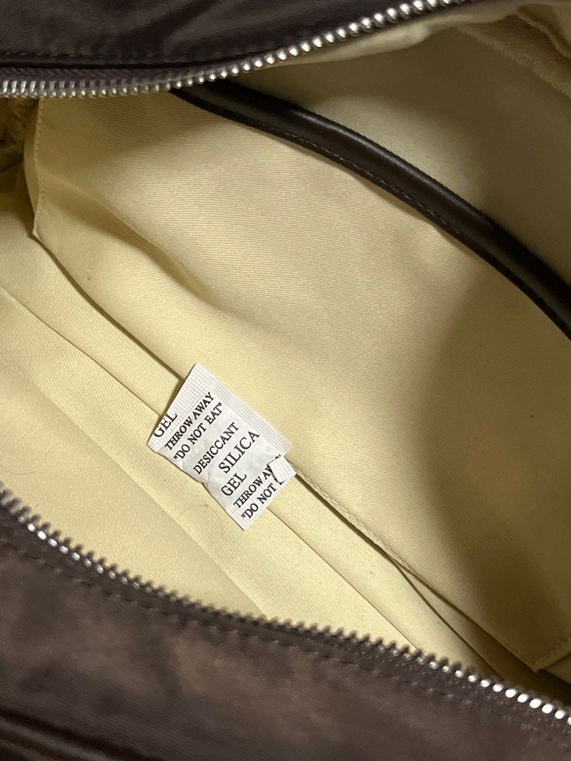 GVN Medium Nylon Bowler Bag in Espresso (Category: Shoulder Bags) located in Mandaluyong City. Submitted by hsloml (Listing ID 1409102852, Image 2). Description: — like new condition! such a good piece — no issues, if any, barely noticeable — comes with dust bag + box — RFS: decluttering, have too much bags .