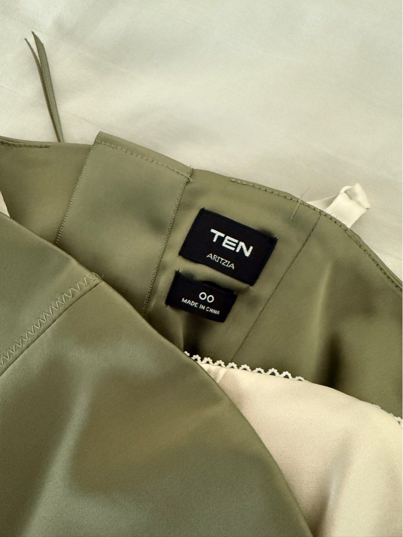 hypnotize satin bustier - sage - aritzia (Category: Sleeveless) located in Mandaluyong City. Submitted by outofstoragewtf (Listing ID 1409124500, Image 3). Description: Retails Php 8,500 or 140 USD This is a bustier top with adjustable straps and princess seams for shaping. It’s crafted from a soft-sheen satin with a smooth feel and stretch for all-day comfort. This fabric is made with 65% recycled polyester.