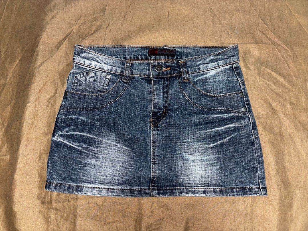 K2 Jeans Denim Mini Skirt (Category: Skirts) located in Angono. Submitted by kalidope (Listing ID 1409235302, Image 1). Description: - K2 Jeans denim mini skirt - Button and zipper closure - Faded wash - Short length - Approximately 28-inch waist - Perfect for casual wear.