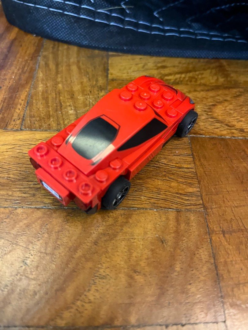 LEGO Shell 40191 Ferrari F12 Berlinetta (Category: Lego & Building Sets) located in Mandaluyong City. Submitted by mar.ang (Listing ID 1409171304, Image 2). Description: Only kept in storage. Some wear expected from general aging, some stickers not applied. Prints still in great condition. Repackaged in ziploc.