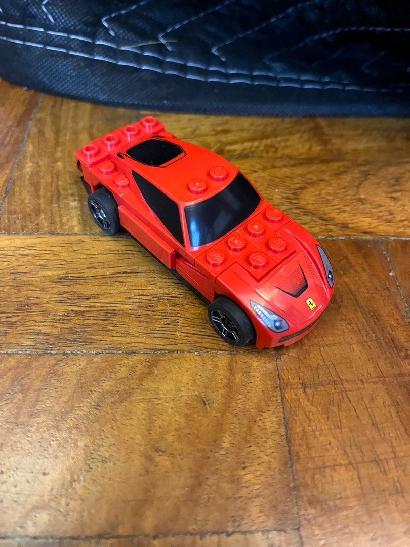 LEGO Shell 40191 Ferrari F12 Berlinetta (Category: Lego & Building Sets) located in Mandaluyong City. Submitted by mar.ang (Listing ID 1409171304, Image 1). Description: Only kept in storage. Some wear expected from general aging, some stickers not applied. Prints still in great condition. Repackaged in ziploc.