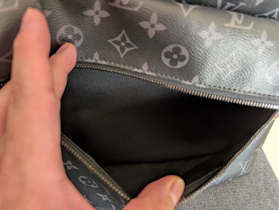 Louis Vuitton Monogram Eclipse Backpack (Category: Bags & Wallets) located in Singapore. Submitted by lawrencelimwb@gmail.com (Listing ID 1409190157, Image 3). Description: - Authentic Louis Vuitton Monogram Eclipse Backpack - Stylish design - Spacious main compartment - Convenient front pocket - Interior slip pocket for organization - Well-maintained zippers - Suitable for everyday use and travel.