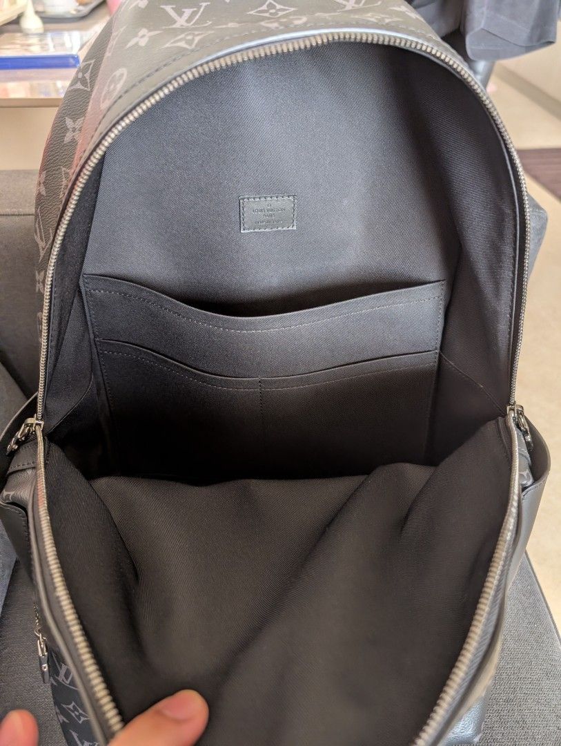 Louis Vuitton Monogram Eclipse Backpack (Category: Bags & Wallets) located in Singapore. Submitted by lawrencelimwb@gmail.com (Listing ID 1409190157, Image 2). Description: - Authentic Louis Vuitton Monogram Eclipse Backpack - Stylish design - Spacious main compartment - Convenient front pocket - Interior slip pocket for organization - Well-maintained zippers - Suitable for everyday use and travel.