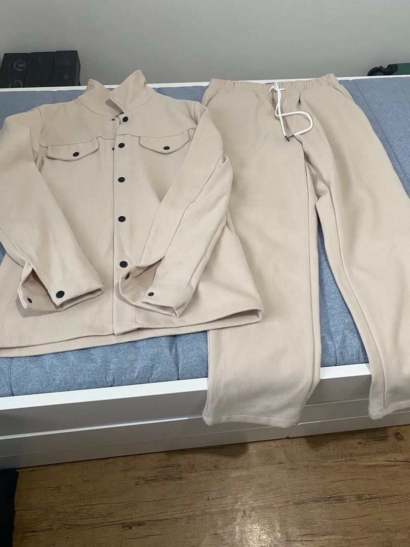 Manfinity Homme Men's Solid Color Terno (Category: Sets & Coordinates) located in Manila. Submitted by capulongava (Listing ID 1409162475, Image 1). Description: - Manfinity Homme terno set for men - Includes a long-sleeved jacket - Jacket features: - Two chest pockets - Button-down closure - Matching pants with drawstring waist - Solid color design this is super nice! perfect cool weather. worn in Japan..