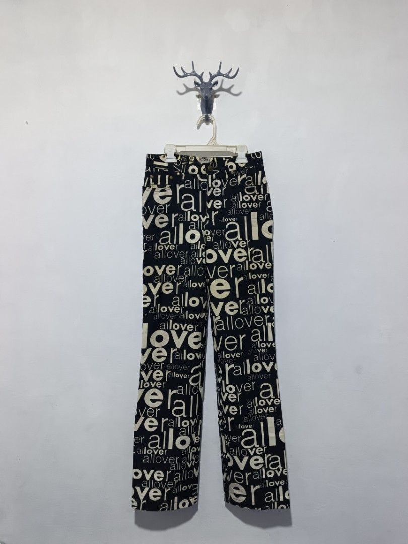 Moschino All Over Love Print Pants (Category: Jeans) located in Cavite. Submitted by lookksph (Listing ID 1409105835, Image 1). Description: - Vintage pants with "love" print - Made in Italy - Size 4 - Material: 100% polyester - Unique design - Dry clean only MODE OF PAYMENT G CASH.