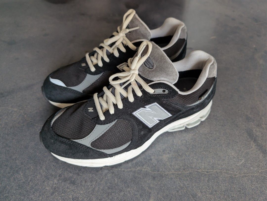 New Balance 2002R Gore-Tex (Category: Sneakers) located in Manila. Submitted by cappinjay (Listing ID 1409157137, Image 1). Description: New Balance 2002R Gore-Tex Black Castlerock - Color: Black and Grey - Size: US 7.5, UK 7, EU 40.5, JPN 25.5 -no original box, will include placeholder box instead -bought from New Balance Osaka, Japan - Includes original shoelaces (grey) and extra laces (cream).