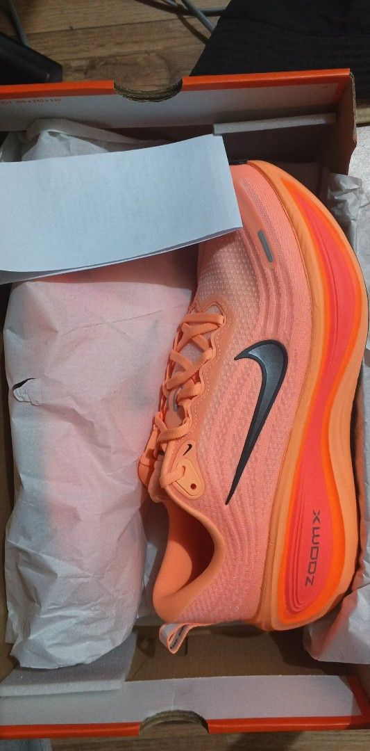 Nike Vomero Plus Pulse Orange Running Shoes (Category: Sneakers) located in Bacoor. Submitted by nmcave (Listing ID 1409220659, Image 2). Description: ‼️LAST CHANCE TO GET THIS COLORWAY IN A SIZE 12 US !!! - RARE BIG SIZE - BIG SIZES ARE OUT OF STOCK - USED TWICE - Nike Vomero Plus running shoes - Pulse orange colorway - Features ZoomX sole - Sleek design - Size: US 12 - Includes original box - Made in Vietnam - Black Nike swoosh on the side.