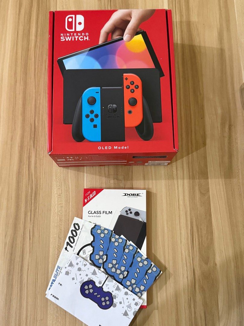 [Brand New] Nintendo Switch OLED with Datablitz 5k GC (Category: Nintendo) located in Taguig. Submitted by miadeclutters (Listing ID 1409230079, Image 1). Description: Comes with: - Datablitz GC for 5k - NSW Dobe Glass Film For N-S Oled.