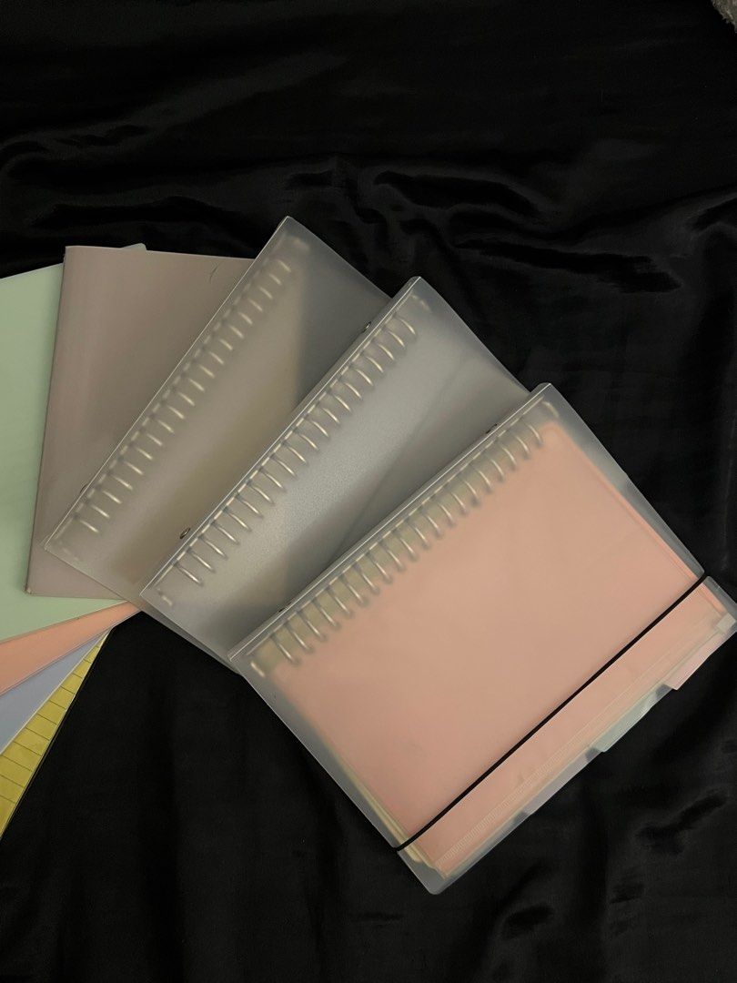 Notebook Bundle (Category: Laptops & Notebooks) located in Malabon City. Submitted by rika_26 (Listing ID 1409228469, Image 3). Description: (2) A5 Binders without Paper (1) A5 Binder with Paper (1) A5 Gray Notebook (1) 1/2 Yellow Crosswise (3) Binder Spiral Notebooks (Pink, Blue & Green) (1) Intermediate Pad Paper *The only one that's used was the binder when I was in SHS, while the rest are new and not used* RFS: Decluttering stationery items .
