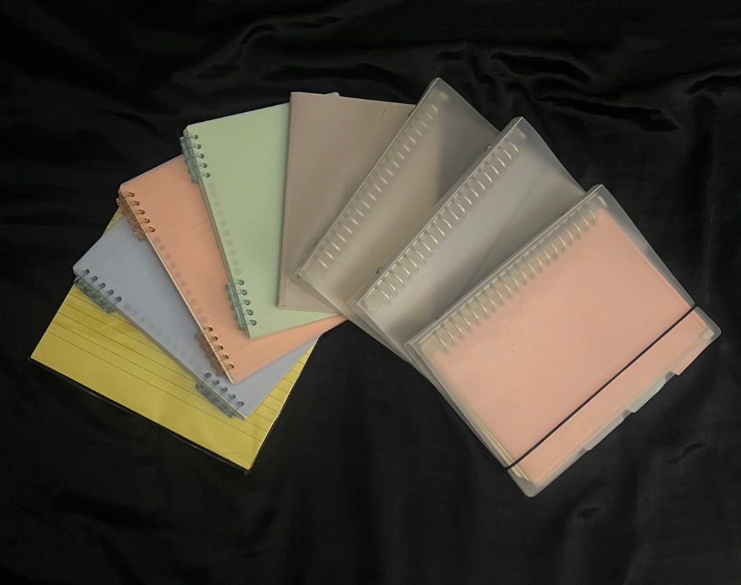 Notebook Bundle (Category: Laptops & Notebooks) located in Malabon City. Submitted by rika_26 (Listing ID 1409228469, Image 1). Description: (2) A5 Binders without Paper (1) A5 Binder with Paper (1) A5 Gray Notebook (1) 1/2 Yellow Crosswise (3) Binder Spiral Notebooks (Pink, Blue & Green) (1) Intermediate Pad Paper *The only one that's used was the binder when I was in SHS, while the rest are new and not used* RFS: Decluttering stationery items .