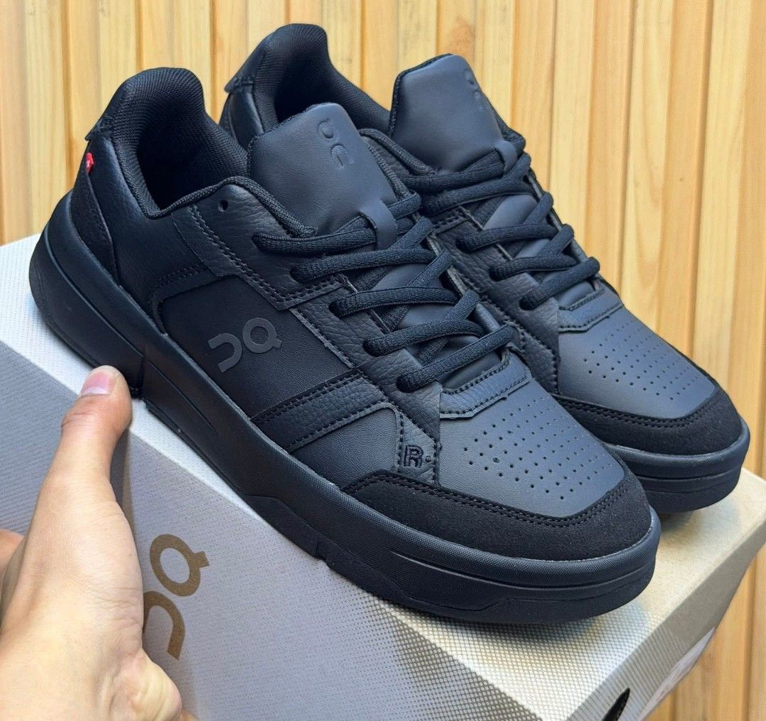 On Cloudnova & Cloud 5 Shoes (Category: Sneakers) located in Manila. Submitted by astiga (Listing ID 1409144640, Image 3). Description: - Pair 1: On Cloudnova in white and gray. Features a distinctive sole design. - Pair 2: Black On shoes with an all-black design. - Both pairs are in their original boxes. - Both pairs feature the On logo..