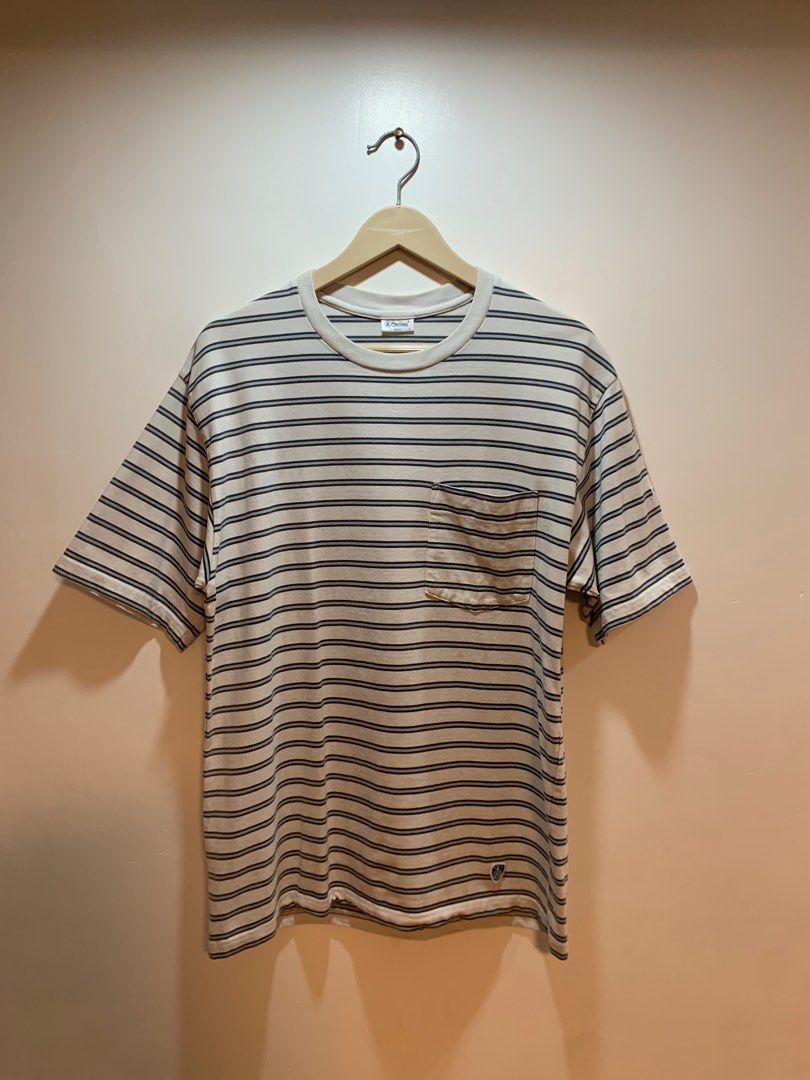 Orcival Striped PocketT-shirt (Category: Tshirts & Polo Shirts ) located in Bacolod City. Submitted by moboandmoga (Listing ID 1409168295, Image 1). Description: Orcival Stripe Pocket Tee Size: Medium frame Excellent Condition! (Sizing info) Width: 20.2 inches Length: 28.5" Orcival striped T-shirt. Features a classic striped pattern with a pocket on the chest. Made from 100% cotton. Size 4. Made in Japan. The shirt has a small Archival logo on th