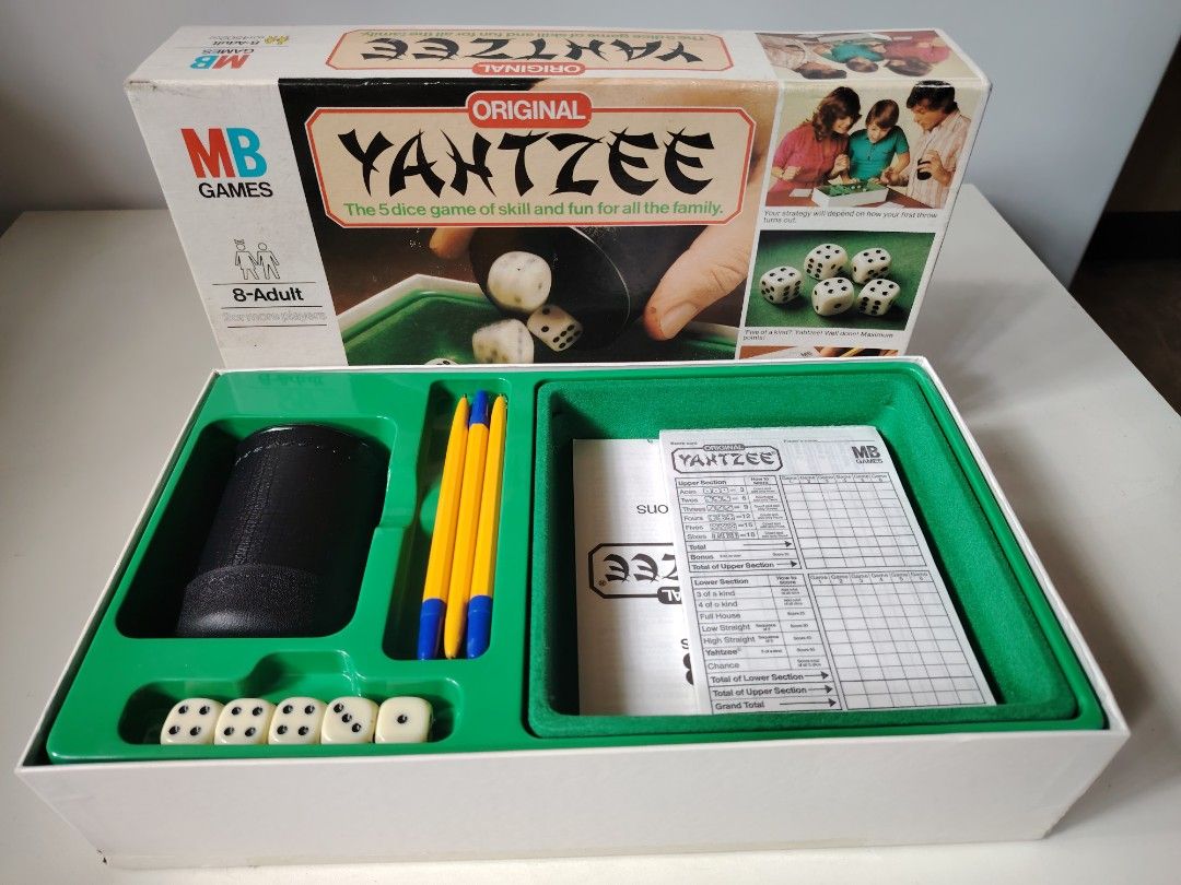 Original Yahtzee Board Game (Category: Board Games & Puzzles) located in General Trias. Submitted by Jingthings (Listing ID 1409241972, Image 1). Description: Classic Yahtzee game for family fun! Includes dice, score sheets, dice cup, and instructions. Suitable for 8+ players..