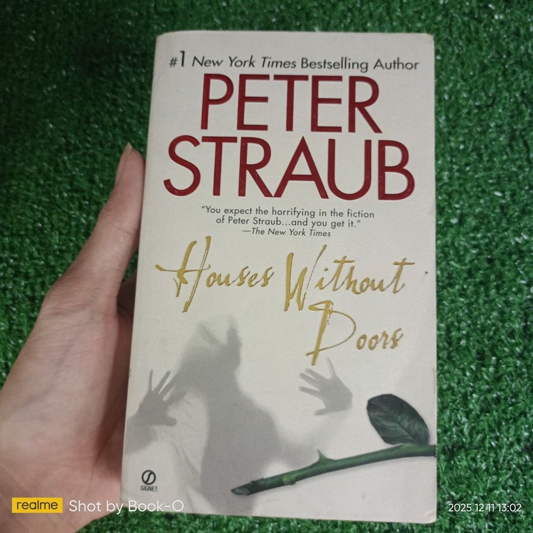 Peter Straub - Houses Without Doors (Category: Storybooks) located in Polangui. Submitted by jumyrace2 (Listing ID 1409114838, Image 1). Description: Paperback book titled "Houses Without Doors" by Peter Straub. It is a Signet Book. The book includes short fiction stories. The back cover has quotes from Publishers Weekly and The Atlanta Journal-Constitution. The book has a blue rose image on the back cover. The book is a series of artistic seduct