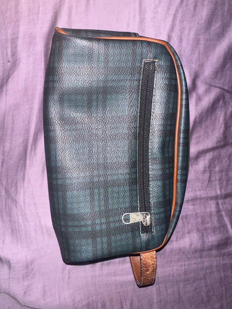 Plaid Leather Clutch Bag (Category: Belt bags, Clutches and Pouches) located in Las Pinas. Submitted by essentialsbyj (Listing ID 1409178764, Image 3). Description: Leather Clutch Bag Issue: cracks/fading of brown leather strap but still in tact Bag itself is in mint condition! 📍l Las Pinas (df shouldered by buyer) .