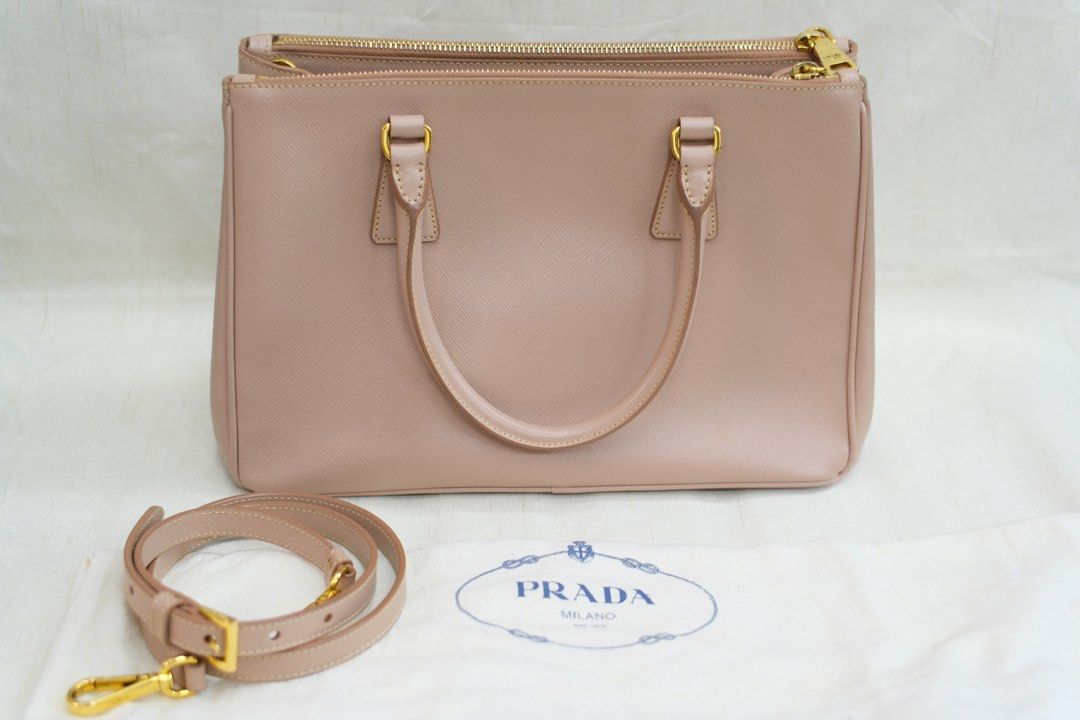 PRADA DOUBLE ZIP (Category: Luxury Bags & Wallets) located in Quezon City. Submitted by mcikgm (Listing ID 1409222868, Image 2). Description: - PRADA Double Zip Galleria Saffiano Leather bag - With Authenticity Cert - Blush pink color - Crossbody style with detachable strap - Features gold hardware.
