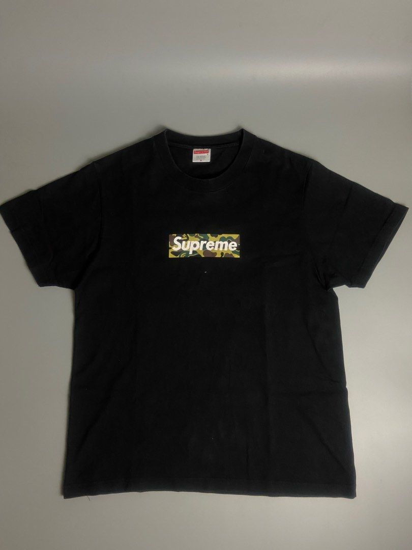 supreme bape box logo (Category: Tshirts & Polo Shirts ) located in San Fernando. Submitted by dippedrops (Listing ID 1409163871, Image 1). Description: supreme bape excellent condition no issue need wash dimes : 19x25.