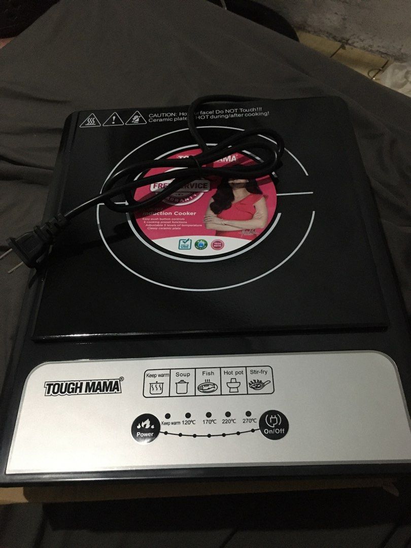 Tough Mama Induction Cooker NTM-IC7 (Category: Cookers) located in Mandaluyong City. Submitted by itsme_mae (Listing ID 1409217324, Image 2). Description: - Tough Mama Induction Cooker with FREE pot! - Easy-to-use push button controls. - 5 convenient cooking preset functions. - Adjustable temperature with 5 levels. - Features a classy ceramic plate. - Powerful 1500 watts. - Easy to clean..