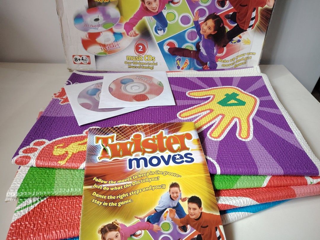 Twister Moves Game (Category: Board Games & Puzzles) located in General Trias. Submitted by Jingthings (Listing ID 1409240297, Image 1). Description: Twister Moves game with CDs. Follow the moves and dance your way to fun! Includes game mat and CDs. Perfect for kids and adults..