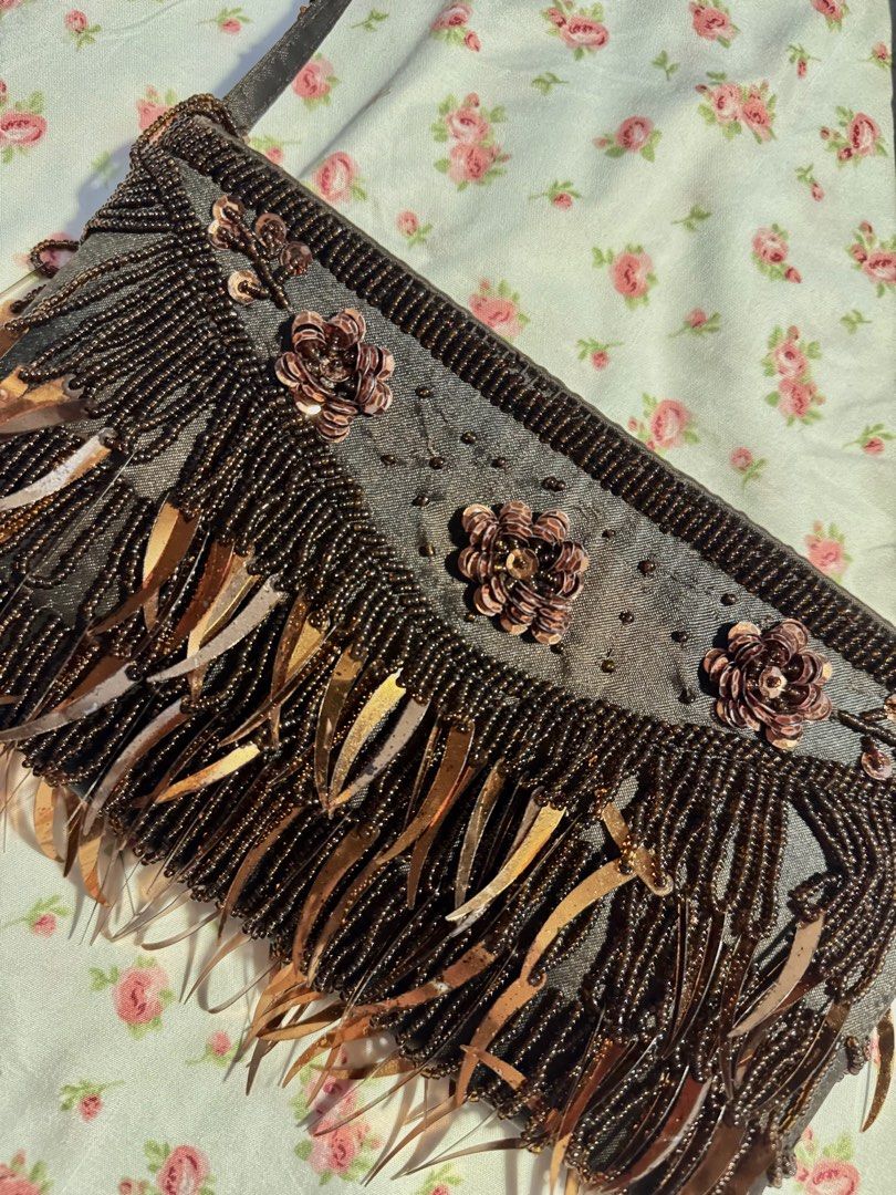 Vintage Beaded Fringe Evening Bag (Category: Shoulder Bags) located in Davao. Submitted by esotericprincess (Listing ID 1409138052, Image 2). Description: Selling my vintage beaded evening bag with full sequin + bead detailing and dramatic fringe. Super unique, handmade feel, and perfect for parties, formal events, concerts, or Y2K-inspired outfits. DETAILS: • Color: Brown with gold and bronze accents • Floral sequin appliqué on the flap • Full b