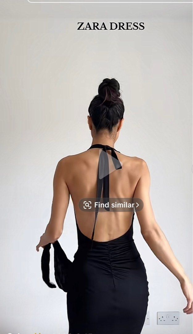 Zara Halter Neck Slit Dress (Category: Dresses) located in Quezon City. Submitted by itsalexandra (Listing ID 1409074709, Image 2). Description: - Fit on medium ✨ Zara black halter dress - Low back design - Midi length - Features a side slit - Decorative ring detail - Perfect for special occasions.