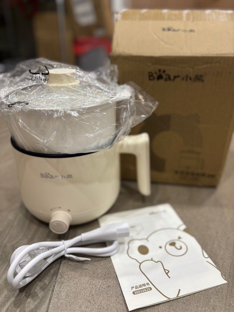 New- Bear Multi Cooker Steamer (Category: Cookers) located in Petaling Jaya. Submitted by shanne123 (Listing ID 1404270146, Image 2). Description: - Brand new Bear multipurpose electric cooker with glass lid - Perfect for students dormitory or home use. - 800W heating element with dual temperature adjustment. - Multiple cooking functions, including steaming, slow cooking, and hot pot. - with high temperature and anti-dry burning protection..