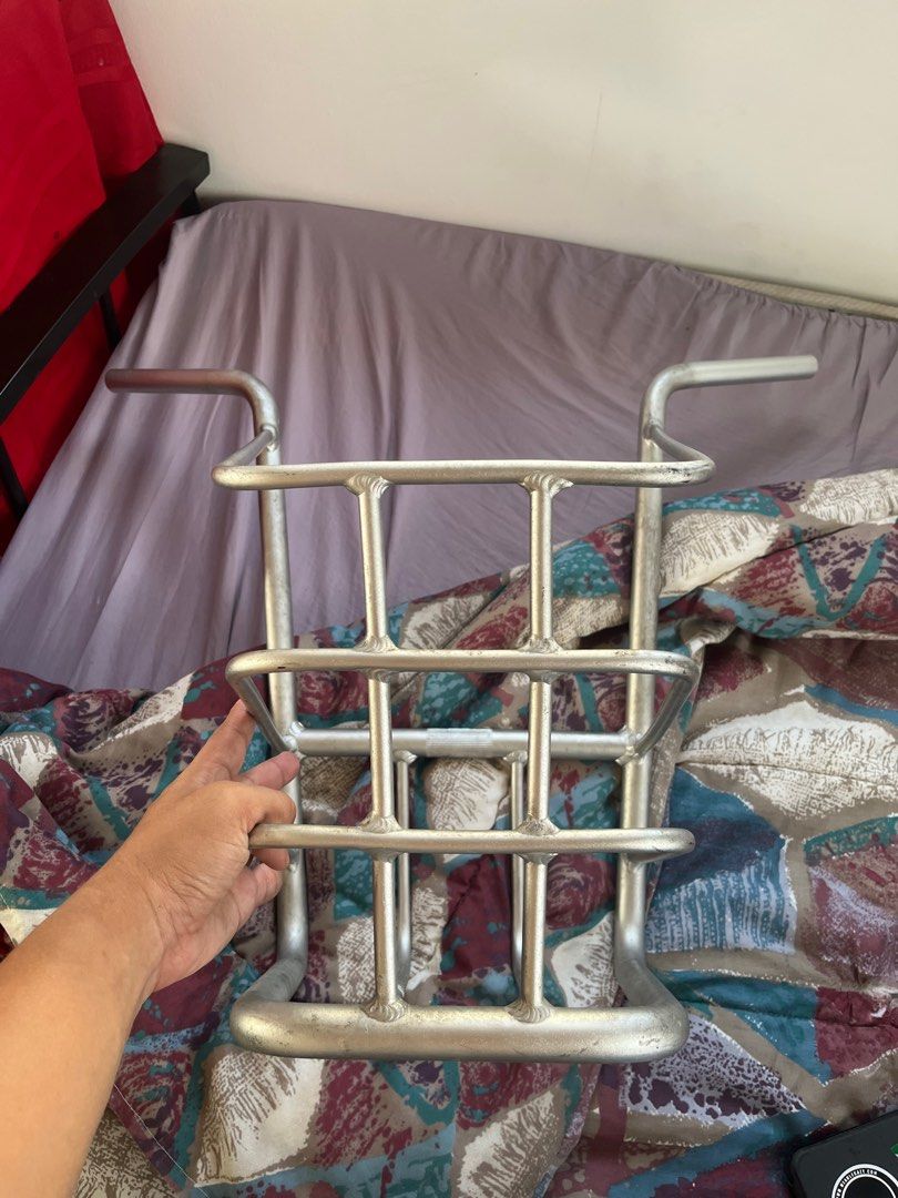 Bike Basket (Category: Bicycles) located in Manila. Submitted by lutherfrank (Listing ID 1409377654, Image 3). Description: Bike basket for front attachment. Rectangular shape with grid design. Features two curved handles. Silver color. From Puma Piko Bike .