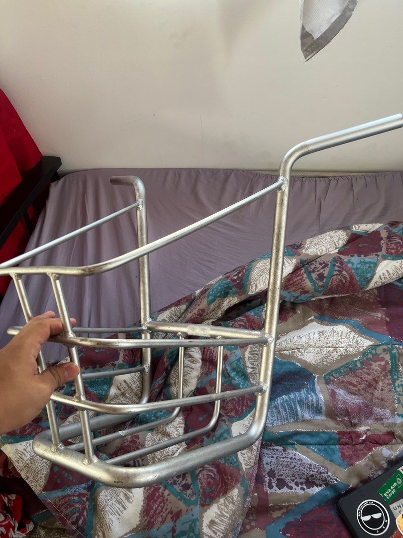 Bike Basket (Category: Bicycles) located in Manila. Submitted by lutherfrank (Listing ID 1409377654, Image 1). Description: Bike basket for front attachment. Rectangular shape with grid design. Features two curved handles. Silver color. From Puma Piko Bike .
