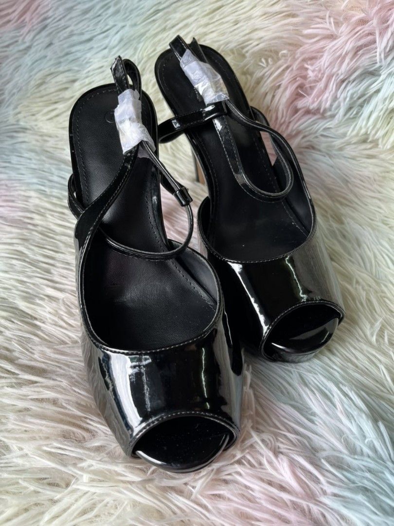Black Patent Leather Heels Size 37 (Category: Heels) located in Pasay City. Submitted by trioglam (Listing ID 1409398885, Image 2). Description: - Black patent leather peep-toe heels - Size 37 - 23 cm insole - 3.5-inch stiletto heel - Features a slender ankle strap - Ideal for special occasions and adding elegance - NO BOX.POUCH ONLY.