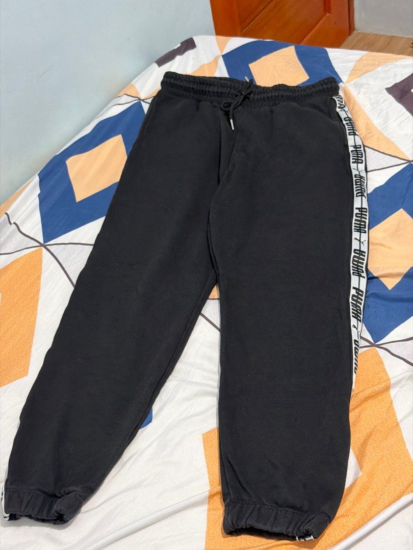 Puma Black Sweatpants Bundle Set (Category: Joggers) located in San Mateo. Submitted by salvekamik84781 (Listing ID 1409330998, Image 2). Description: - Black Puma sweatpants - Available styles: - With Puma logo stripe - With zippered pockets (left pocket issue but can fix) - Features: - Drawstring waistband - Elastic cuffs.