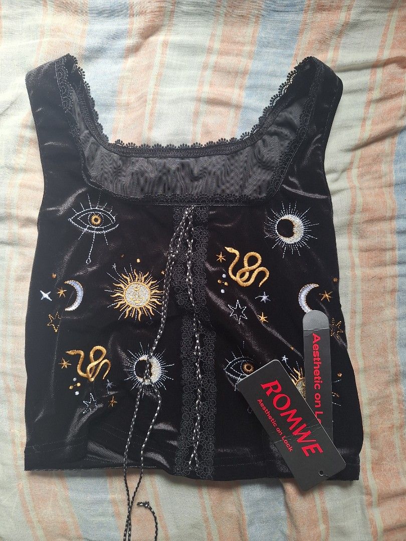 [BRAND NEW UNWORN] ROMWE EDITION Witch Day Moon & Star Embroidered Velvet Top (Category: Sleeveless) located in Marikina City. Submitted by ramenramyeonn (Listing ID 1409296232, Image 1). Description: - Medium - Bought for Php339 - ROMWE EDITION top - Unique celestial embroidery (moons, stars, snakes) - Square neckline - Lace trim - Black velvet material - Tie-up detail - Size guide available in images Reason for selling: Don't need it anymore as