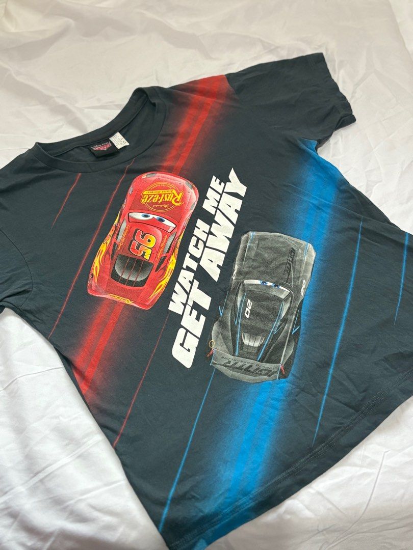 Cars Lightning McQueen T-shirts (Category: Babies & Kids Fashion) located in Norzagaray. Submitted by laurainees93109 (Listing ID 1409430610, Image 2). Description: 10/10 CONDITION. ORIGINAL SLIGHTLY USED - Lightning McQueen t-shirts available! - Choose from two designs: - Red shirt with "I AM SPEED" graphic - Dark grey shirt with "WATCH ME GET AWAY" graphic - Made from comfortable cotton material. - Ideal for casual wear..