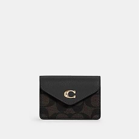 Coach Tammie Card Case (Category: Luxury Bags & Wallets) located in Manila. Submitted by an.g_ (Listing ID 1409426380, Image 1). Description: .