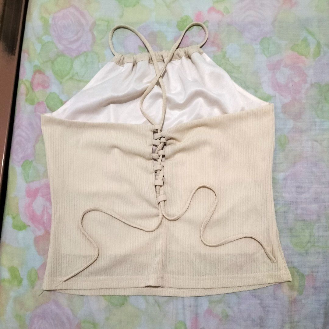 Cream Beige Beach Spaghetti Straps Top (Category: Sleeveless) located in San Fernando. Submitted by decluttrwithella (Listing ID 1409333497, Image 2). Description: Size: XS-S, measurements are shown in the photos (please allow 1-2 cm difference)📸 Color: Cream/Beige (colors shown in photos may vary slightly due to lighting and different screens) Condition: Thrifted, super cute, no flaws!👌 PLS READ👇 - Payments thru Gcash - Shipping thru J&T - No