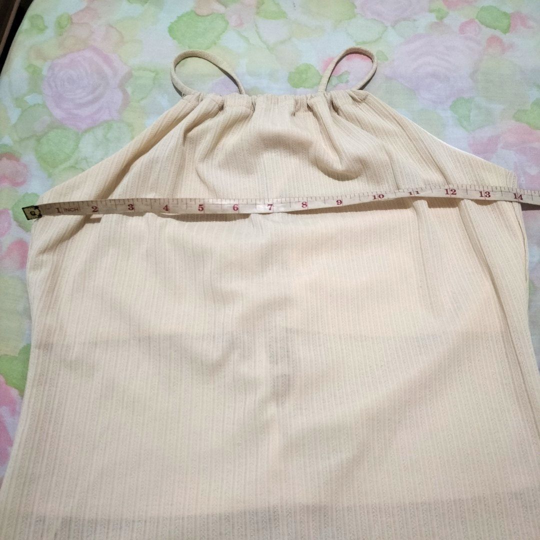 Cream Beige Beach Spaghetti Straps Top (Category: Sleeveless) located in San Fernando. Submitted by decluttrwithella (Listing ID 1409333497, Image 3). Description: Size: XS-S, measurements are shown in the photos (please allow 1-2 cm difference)📸 Color: Cream/Beige (colors shown in photos may vary slightly due to lighting and different screens) Condition: Thrifted, super cute, no flaws!👌 PLS READ👇 - Payments thru Gcash - Shipping thru J&T - No