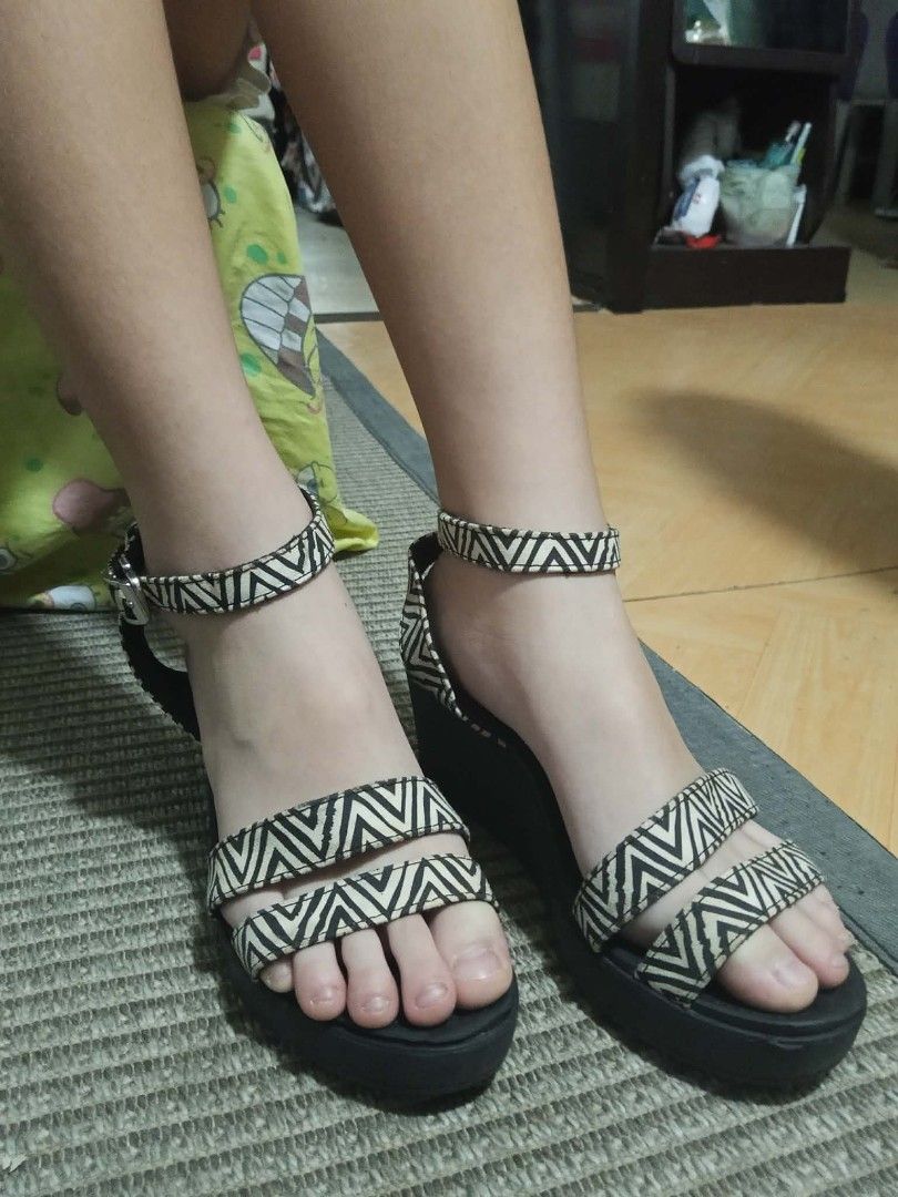 Crocs Leigh Ankle Wedge Sandals - Black/White (Category: Wedges) located in Pasig City. Submitted by ani2684 (Listing ID 1409355731, Image 1). Description: - Crocs Leigh Ankle Wedge sandals - Stylish black and white geometric pattern - Features ankle strap and two foot straps - Black sole with Crocs logo - Size 7 - .