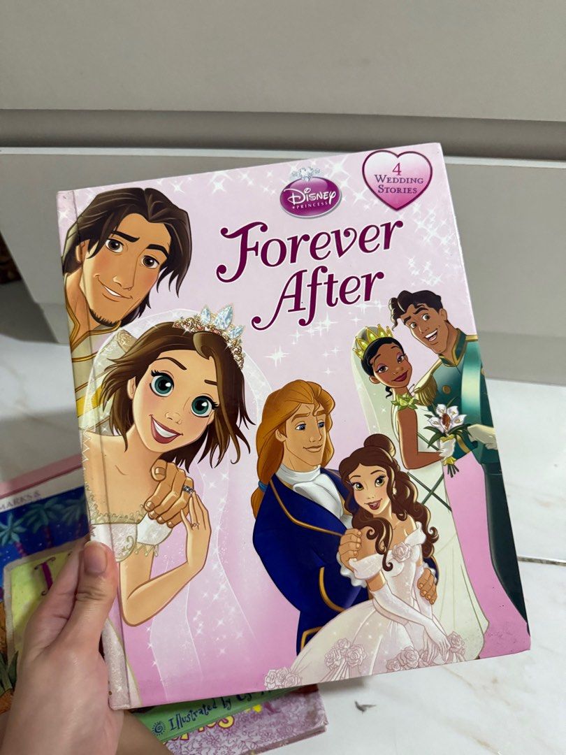 Disney Princess Forever After Book (Category: Storybooks) located in Las Pinas. Submitted by bellamommaaaa (Listing ID 1409404232, Image 1). Description: Book features four wedding stories from Disney Princesses: Cinderella, Beauty and the Beast, The Princess and the Frog, and Tangled. It includes beautiful illustrations and tells the stories of the princesses' special days. Perfect for Disney fans of all ages..