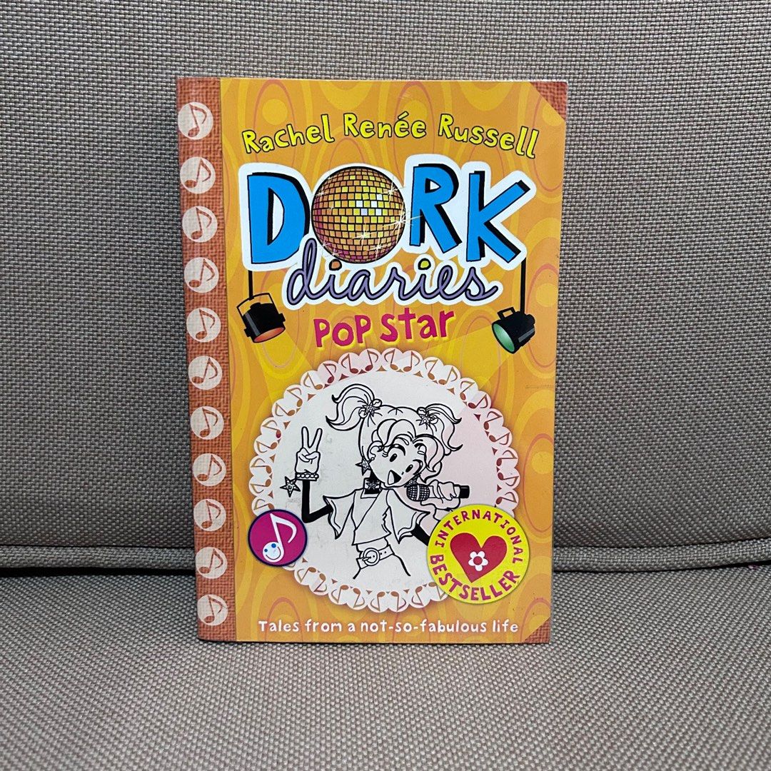 Dork Diaries #3: Tales from a Not-So-Talented Pop Star by Rachel Renée Russell (Category: Children's Books) located in Mandaluyong City. Submitted by ysxbelx (Listing ID 1409360786, Image 1). Description: - Dork Diaries #3: Tales from a Not-So-Talented Pop Star by Rachel Renée Russell - Pre-Loved but condition is Like New; Book is wrapped with plastic cover - Bought from National Bookstore Promo Price: 2 Dork Diaries Books for P300.00 Whole Set f
