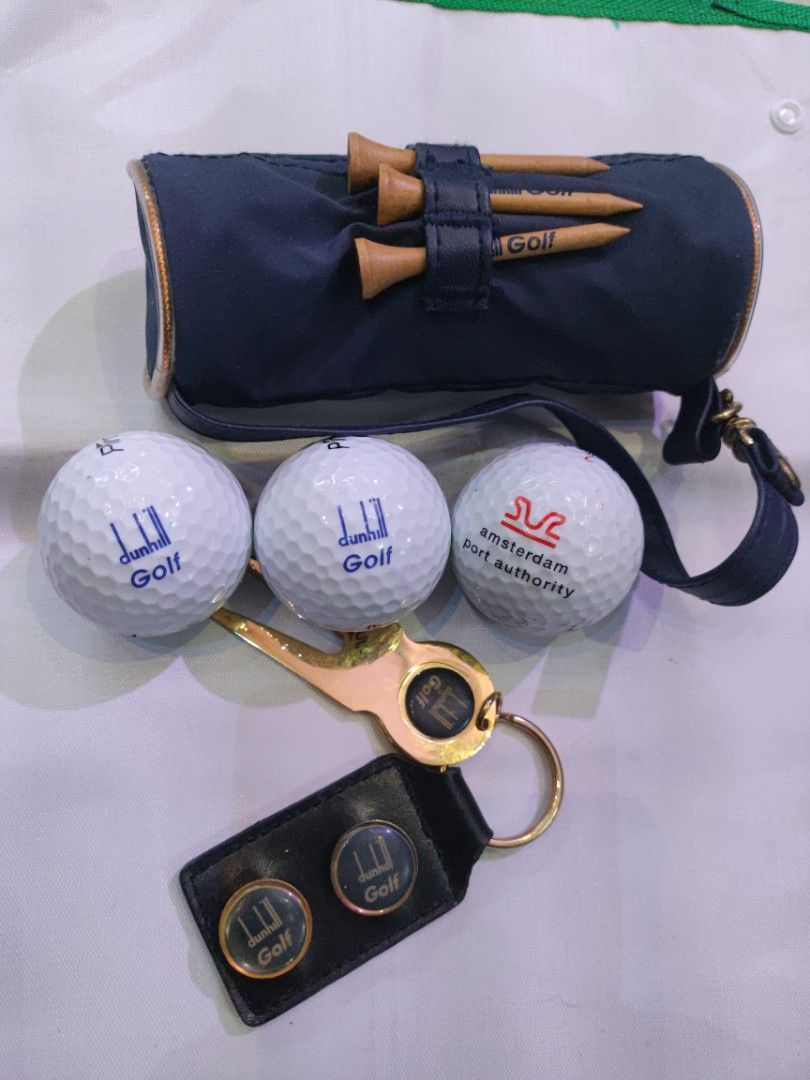 Dunhill Vintage Golf Tee Set with Markers & Divot tool (Category: Golf) located in Baguio. Submitted by greatdealfinder (Listing ID 1409333101, Image 1). Description: Dunhill Vintage Golf Tee Set with Markers & Divot tool 2 balls is dunhill golf...one is port of Amsterdam printed ball. the bag has tee holder..