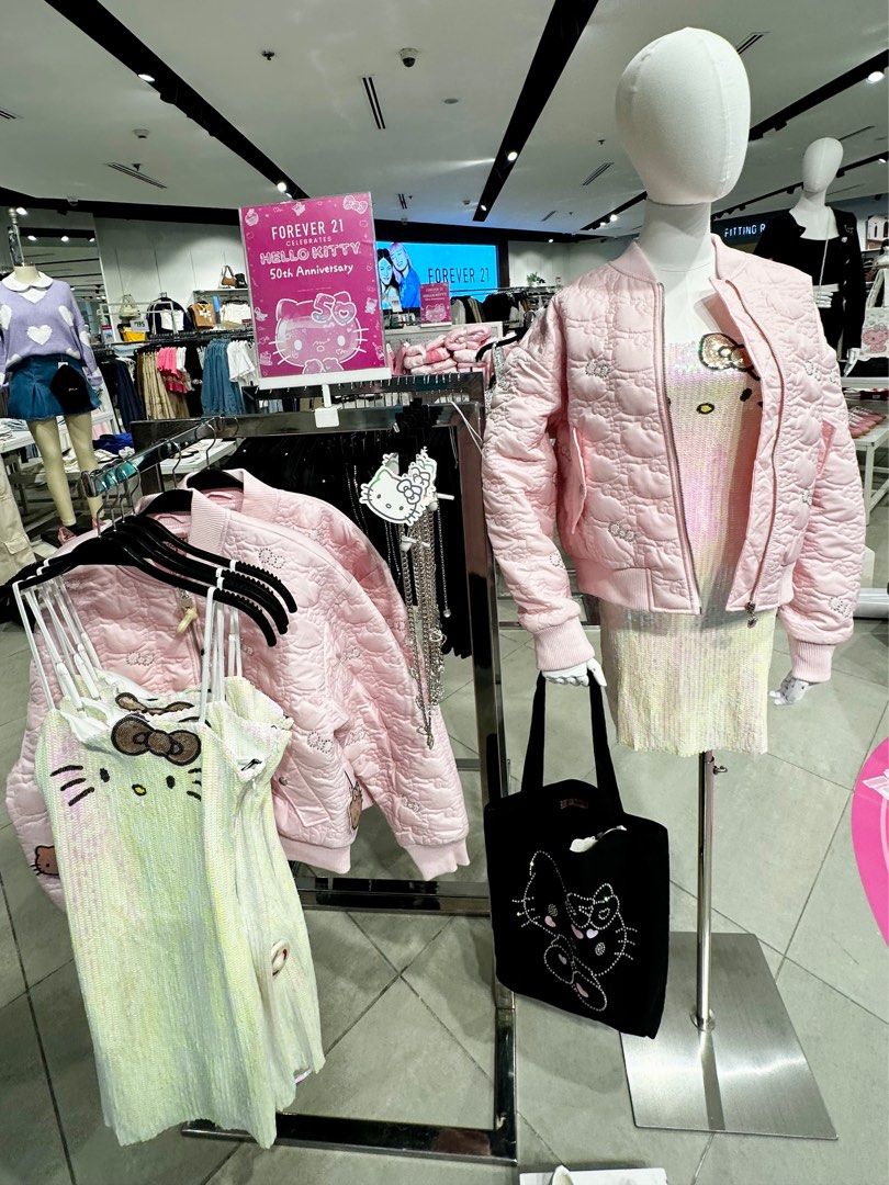FOREVER 21 HELLO KITTY RHINESTONE BOMBER JACKET (Category: Coats, Jackets and Outerwear) located in Makati City. Submitted by avenue.de.belle (Listing ID 1387938536, Image 1). Description: FOREVER 21 x HELLO KITTY RHINESTONE BOMBER JACKET Brand New with tags Forever 21 x Hello Kitty Rhinestone Bows Pink Quilted Bomber Jacket (Medium). Details From our Hello Kitty x Forever 21 collection, this woven bomber jacket features an allover Hello Kitty qu