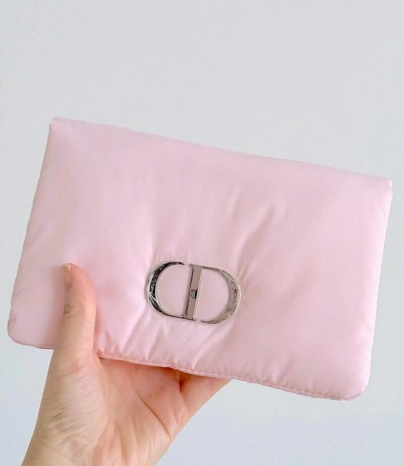 GWP Auth Dior Pink Cosmetic Pouch (Category: Luxury Bags & Wallets) located in Bacoor. Submitted by shynemf.beloy (Listing ID 1409431560, Image 2). Description: - Authentic Dior cosmetic pouch - Soft pink color - Silver-tone CD logo - Quilted design - Snap closure - Satin lining - Ideal for makeup and small essentials.