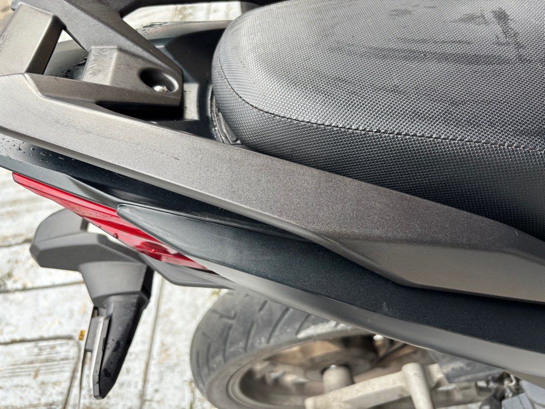 Honda Click 160 2025 bracket (Category: Other Motorcycles Parts and Accessories) located in Quezon City. Submitted by ramil.john34 (Listing ID 1409326773, Image 2). Description: Honda Click 160 2025 Bracket - Motorcycle rear seat cowl - Dark gray finish .