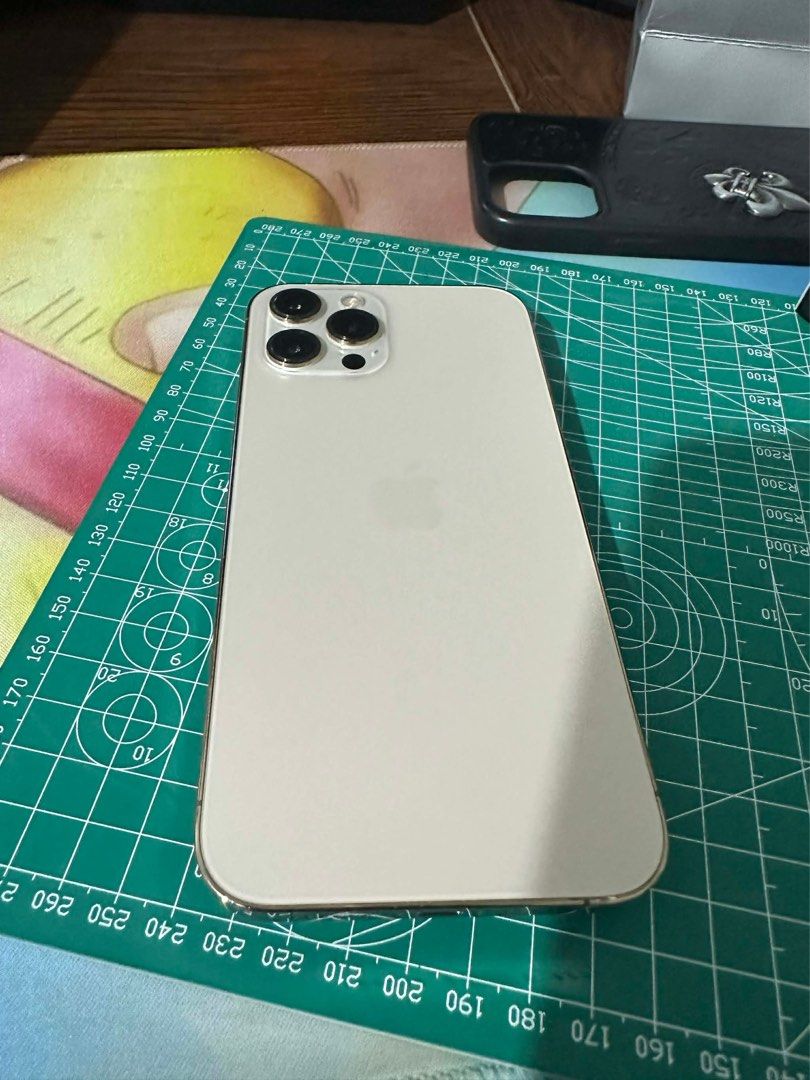 iPhone 12 Pro Max (128GB) — FOR SALE (Category: iPhone 12 Series) located in Manila. Submitted by takemystuffbuymystuff (Listing ID 1409343564, Image 1). Description: 128GB, 76BH, 6.7-inch Super Retina XDR (OLED) display, powered by the A14 Bionic chip with 6GB RAM, a triple 12MP Pro camera system (Wide, Ultra Wide, Telephoto), and 5G connectivity - 76% Battery Health - 128GB storage - RFS: upgraded.